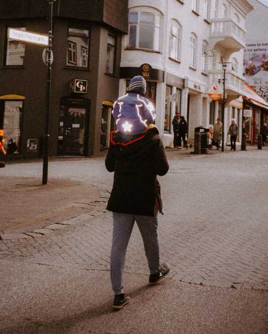 An analog photography of a child on his dad's shoulders took in Reykjavik, Iceland