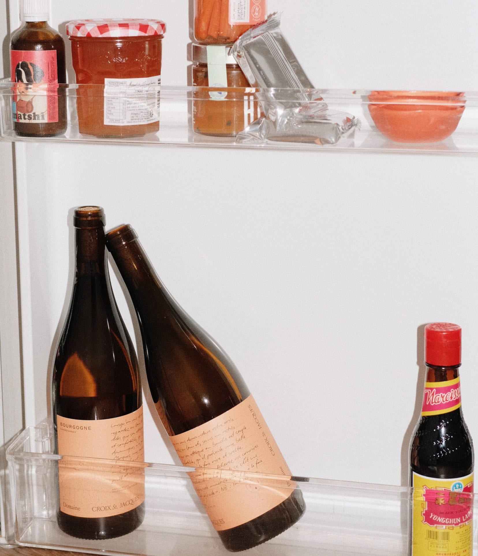 Chardonnay bottles in the fridge, photoshoot for Domaine Croix Saint Jacques, a Burgundy wine producer