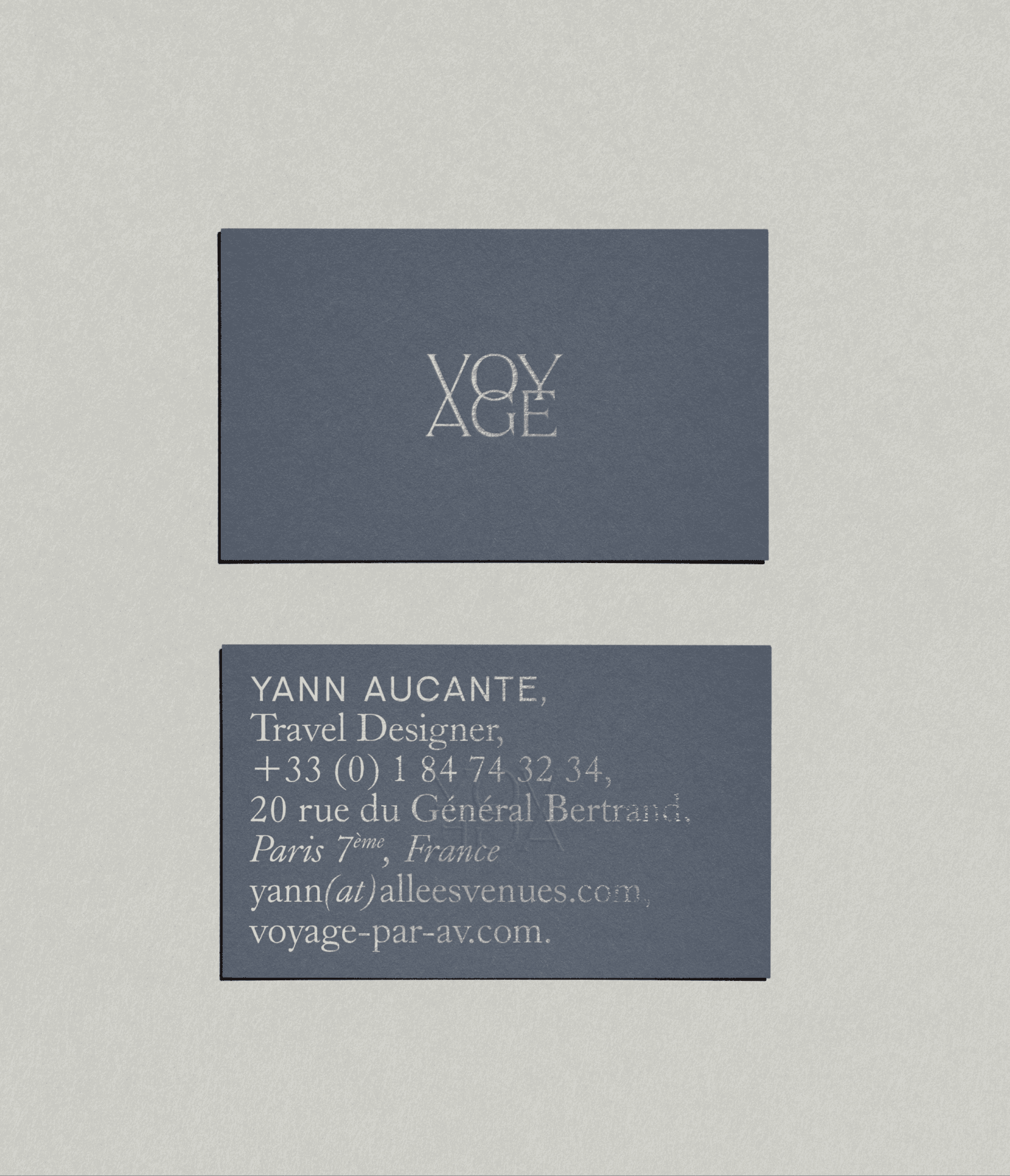 Silver foiled business card design for Voyage parAllees Venues luxury travel agency