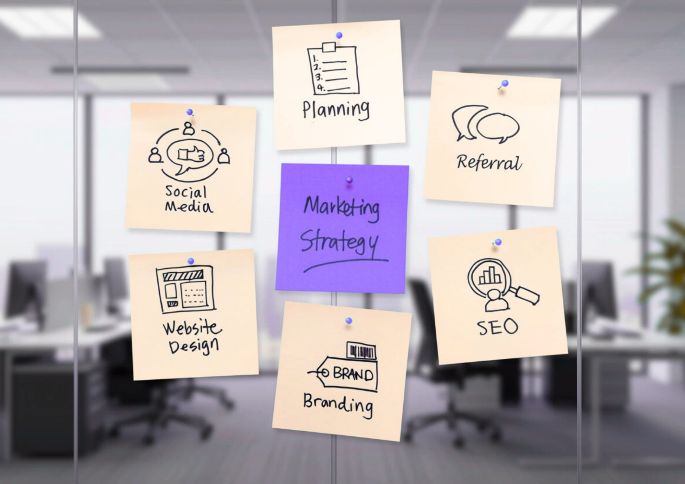 Office glass wall with sticky notes labeled Marketing Strategy, Social Media, Planning, Referral, Website Design, Branding, and SEO.