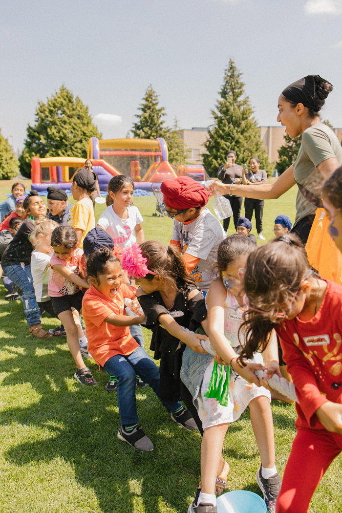 Kids playing tug of war at Sports Events by Sakhi Sikhia