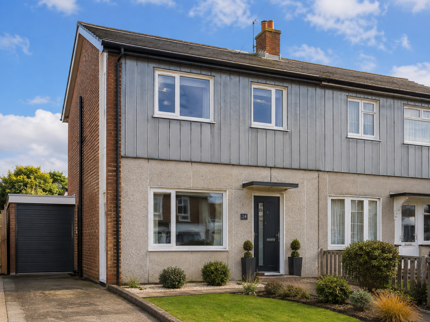 UK residential property with non-standard construction featuring concrete and metal-panel construction