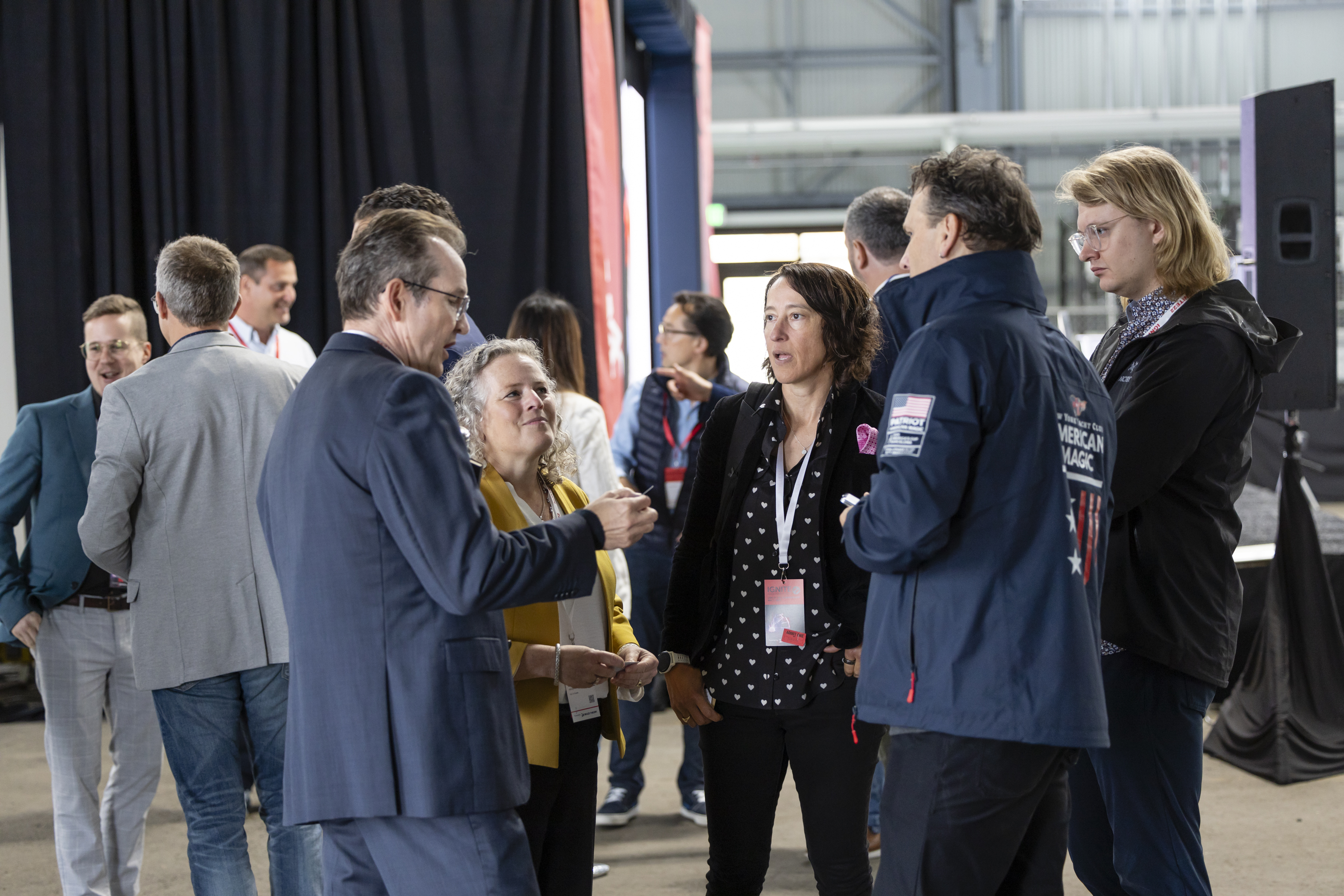 Professionals meeting at a conference.