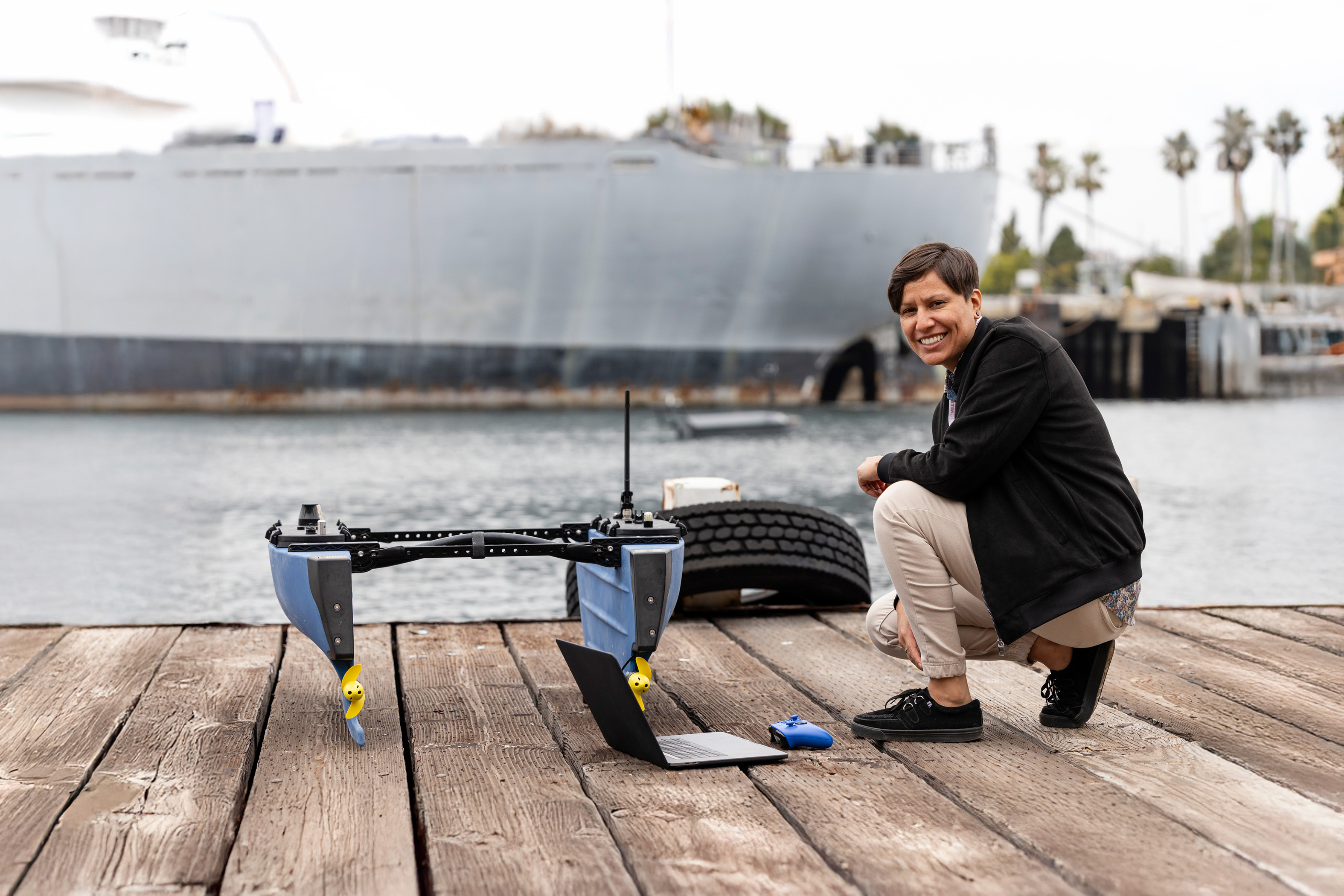 Professional presenting BlueTech technology at the marina.