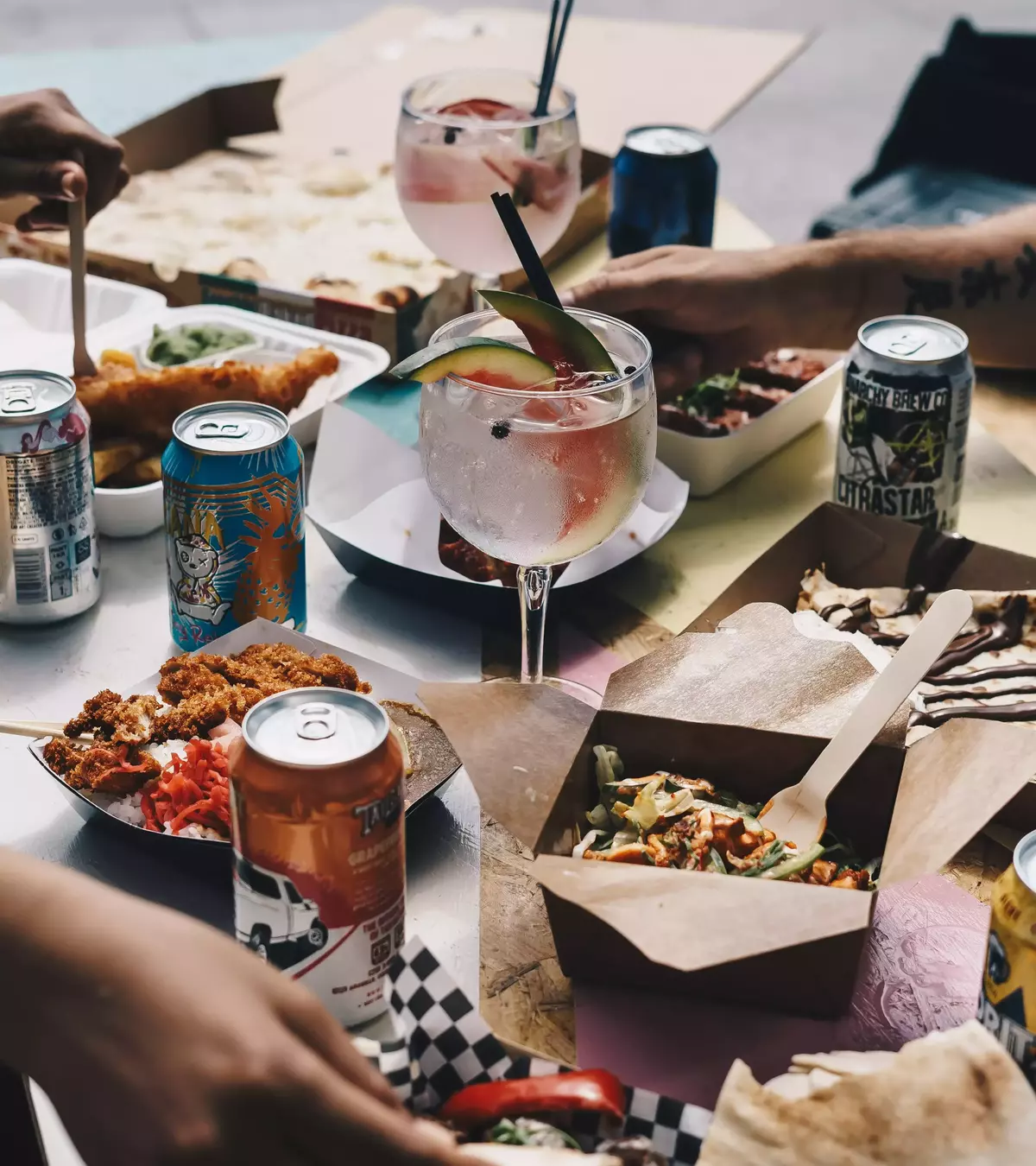 take-out food and pretty cocktail drinks at home