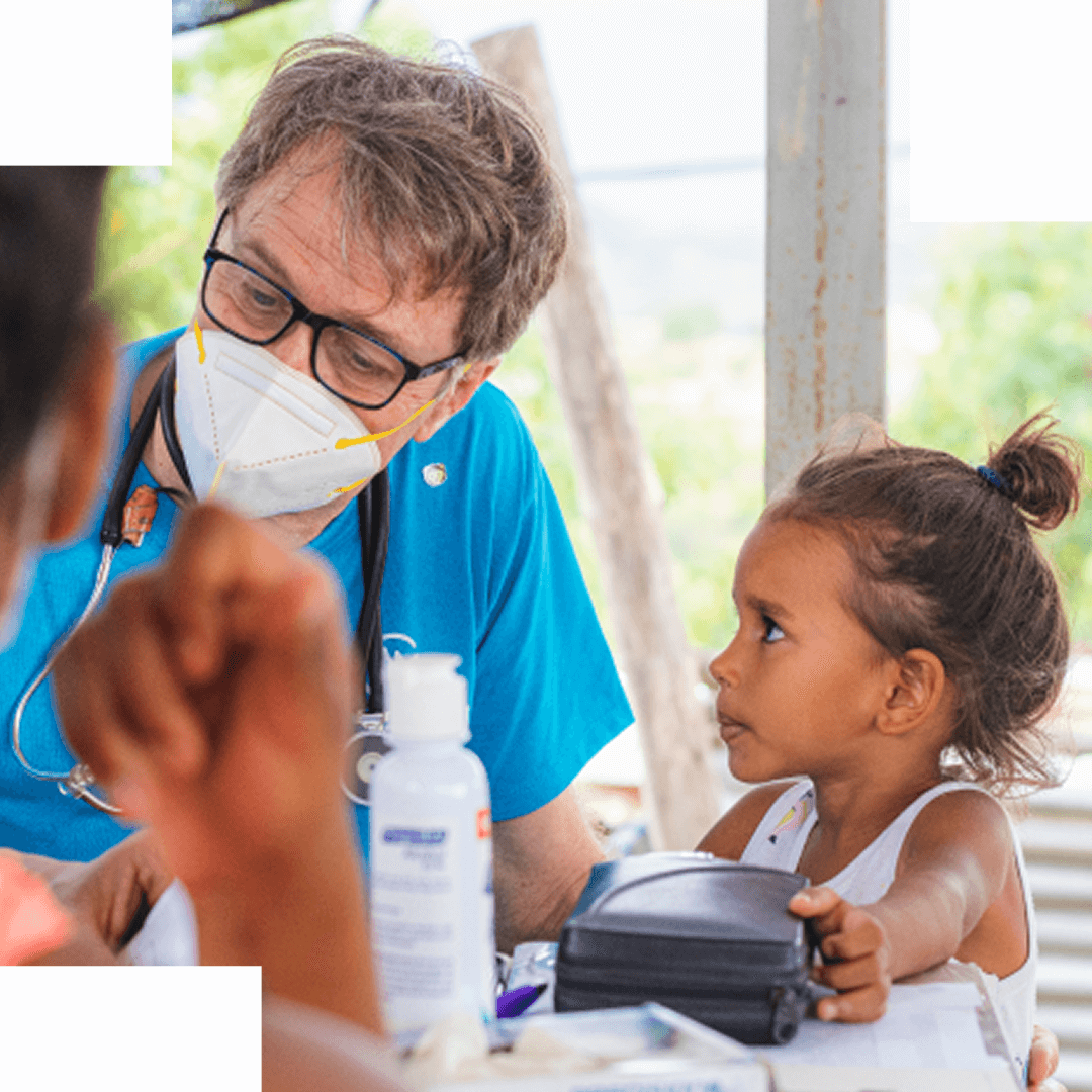 A doctor helping a kid