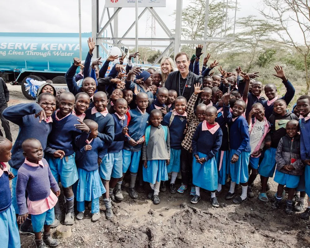 Schoolchildren in Kenya celebrating at a WorldServe water well