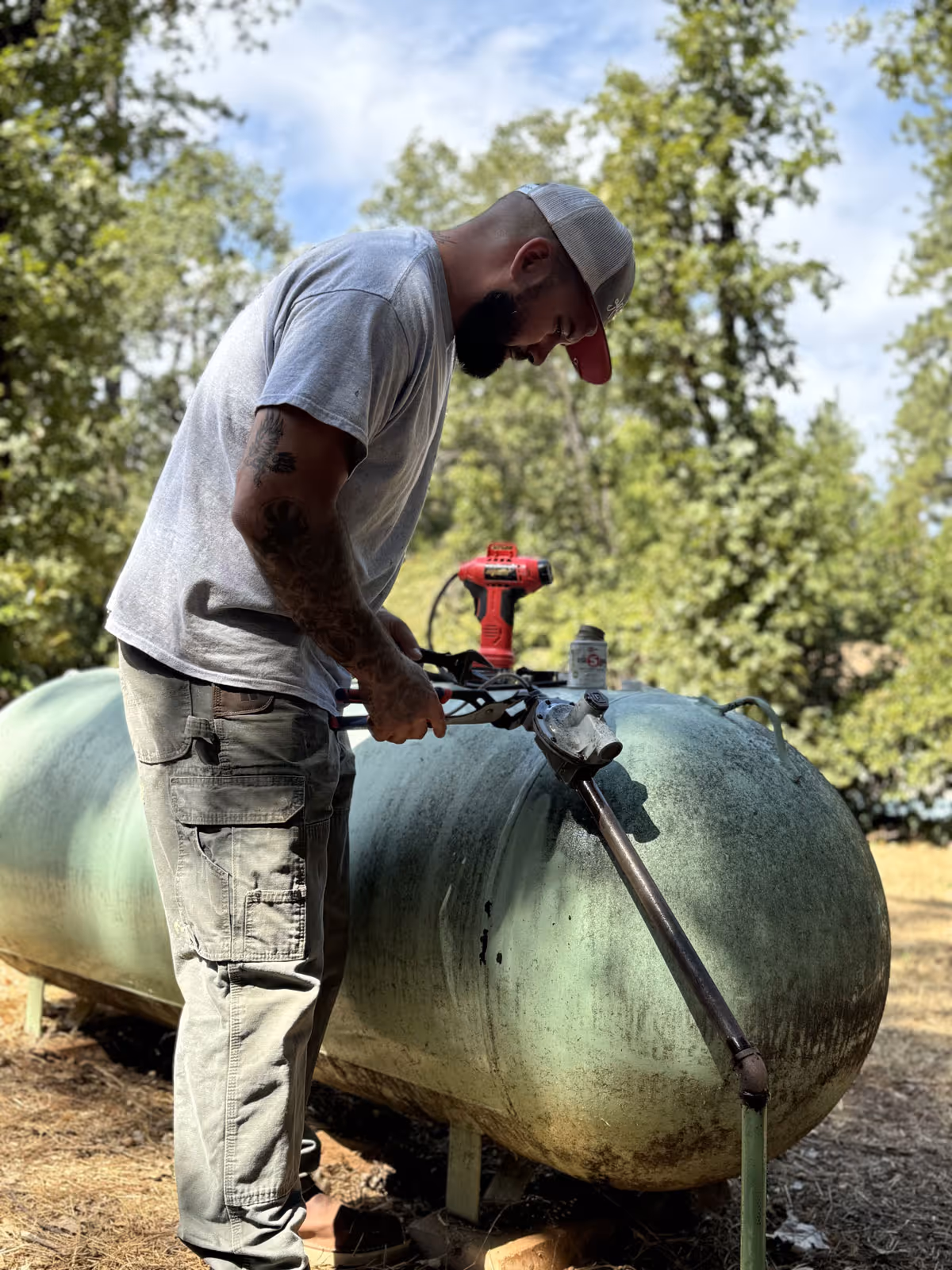 A plumbing technician at Principled Plumbing Inc. is providing a plumbing service in Grass Valley, CA.