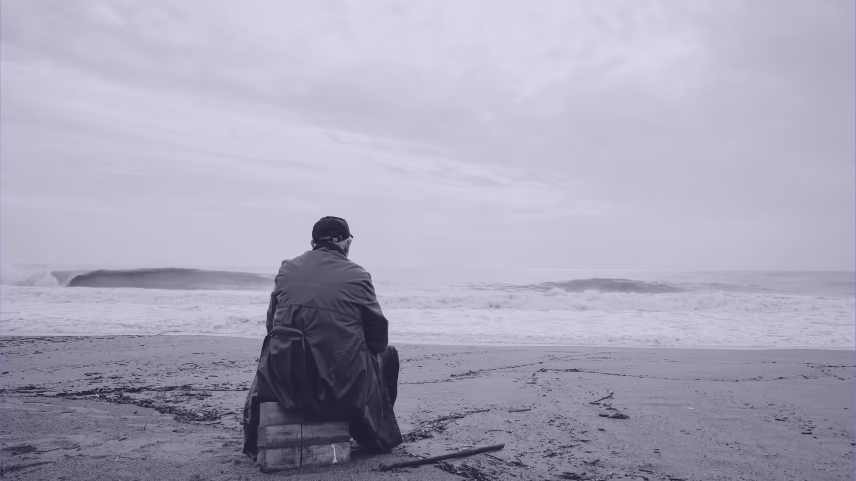 A person sitting on the beach