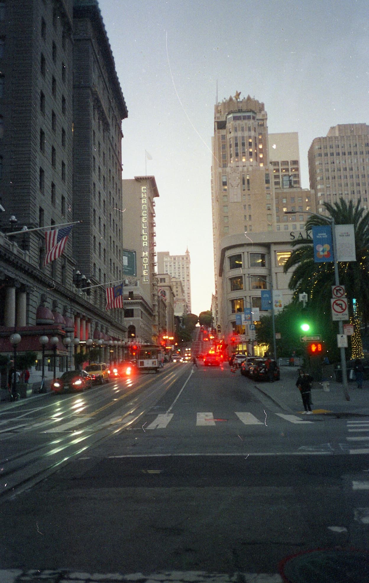 Taken from the street in Union Square, San Francisco, the image captures the famed department stores in the shopping area, along with the palm trees in the square.