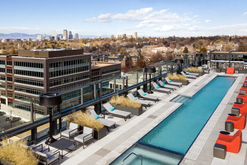 An image taken from the rooftop of the rooftop pool and lounge area at The Jacquard, Autograph Collection hotel in Cherry Creek, Denver. 