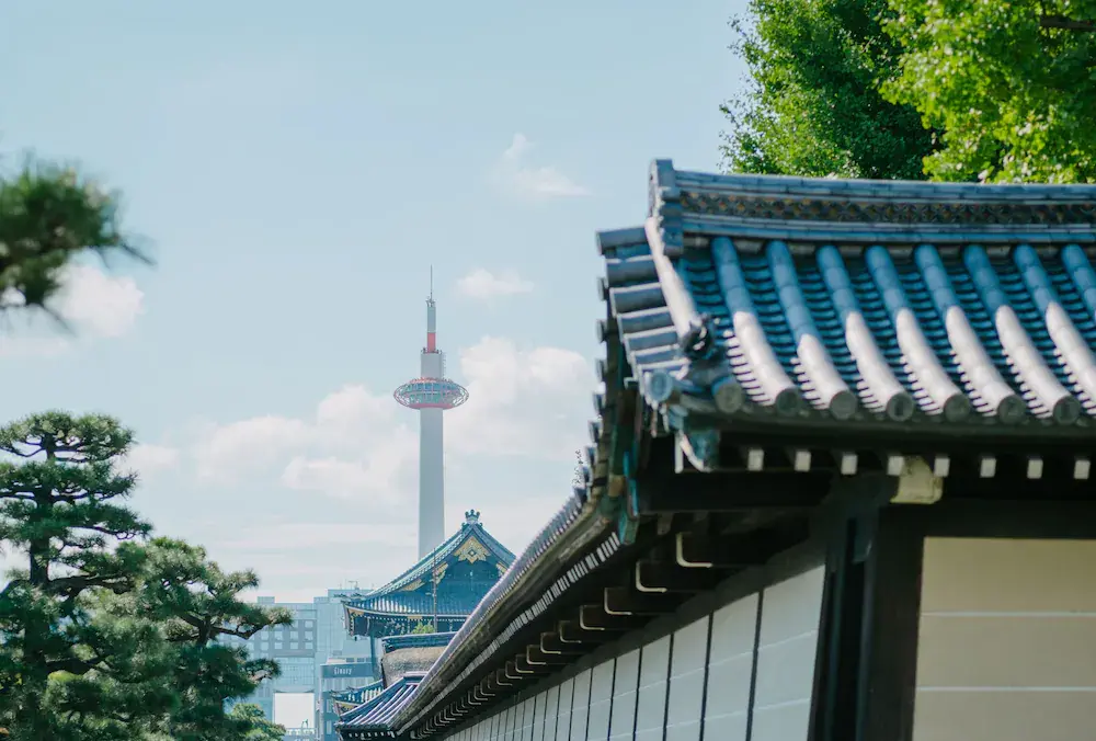 An image of the famous and tall Kyoto Station, a landmark in the Kyoto skyline. Located in the Shimogyo neighborhood in Kyoto, this central neighborhood is home to the tower.