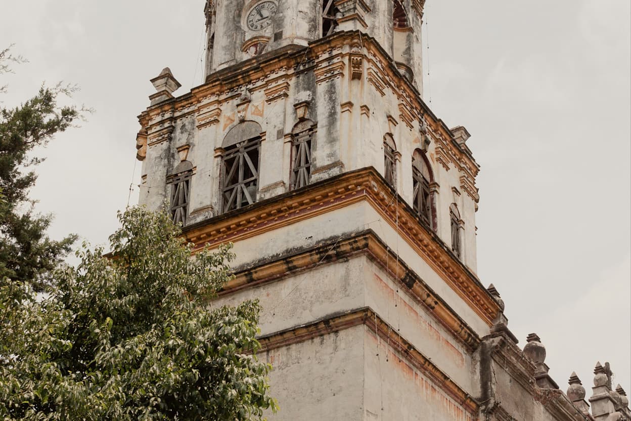The top of a historic building in Coyoacán, Mexico City. 