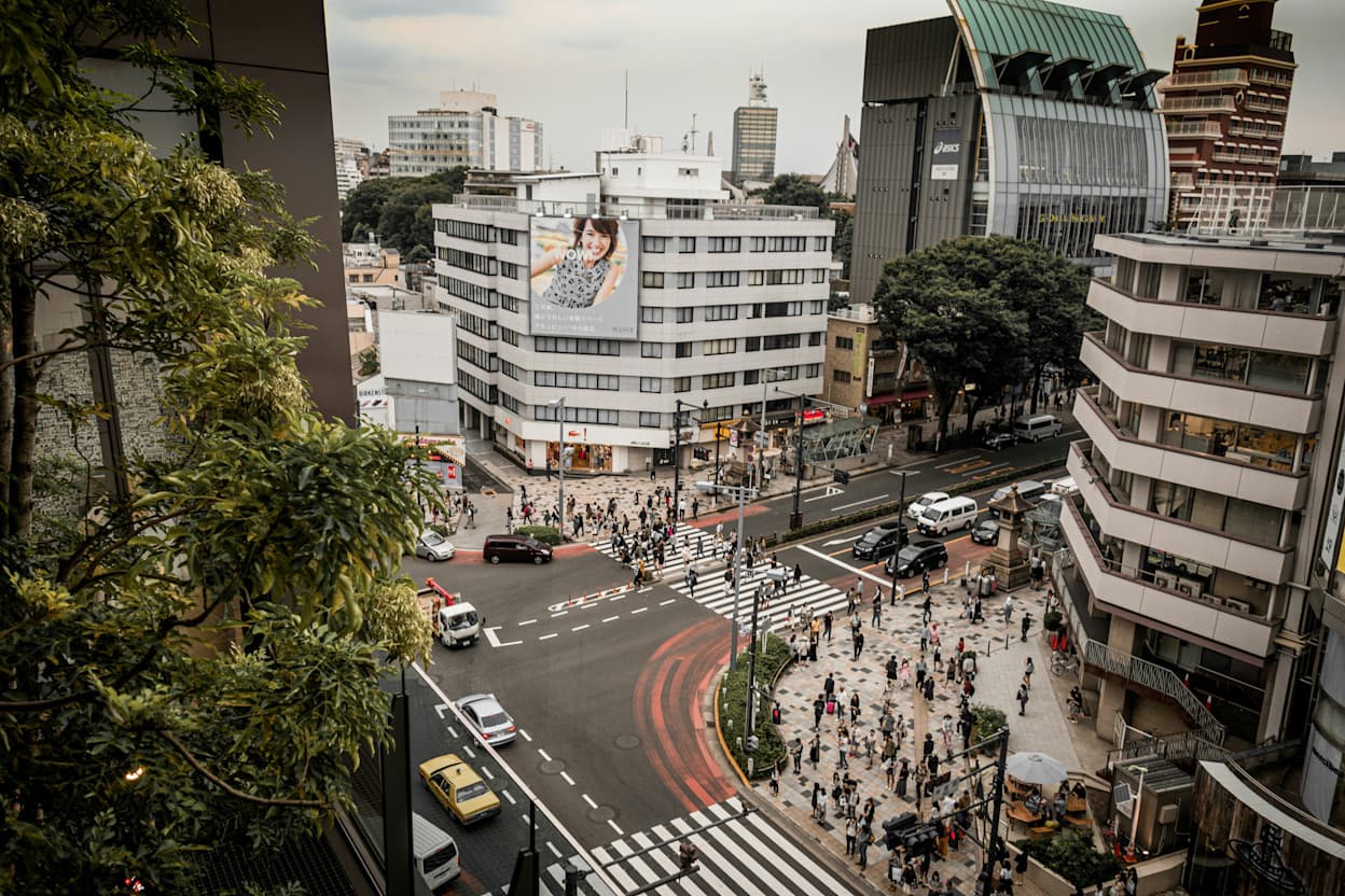 Birds-eye-view on a slightly overcast day of an intersection in one of Tokyo's busy neighborhoods, Harajuku.