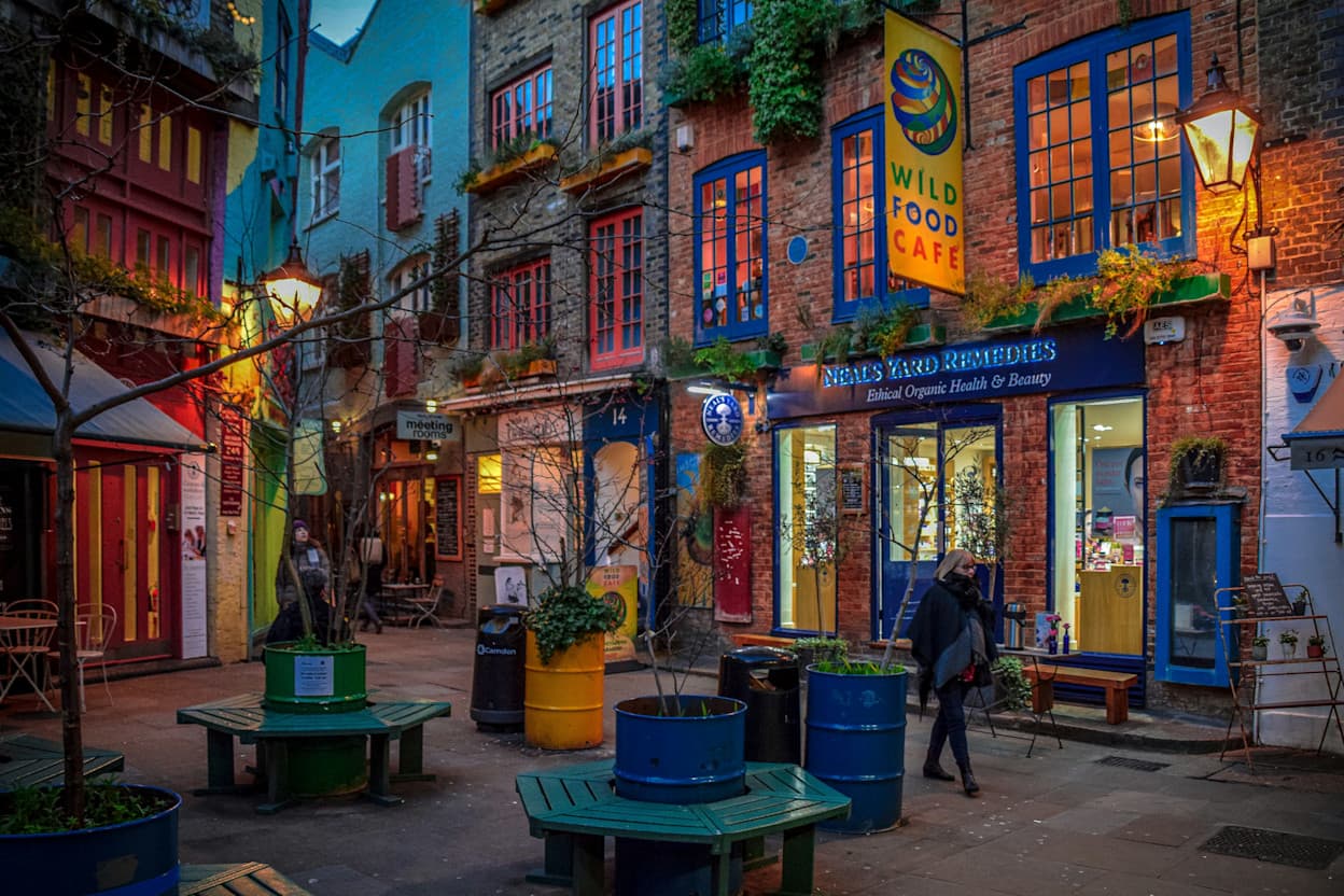 Colorful houses and benches in a square in Covent Garden, London