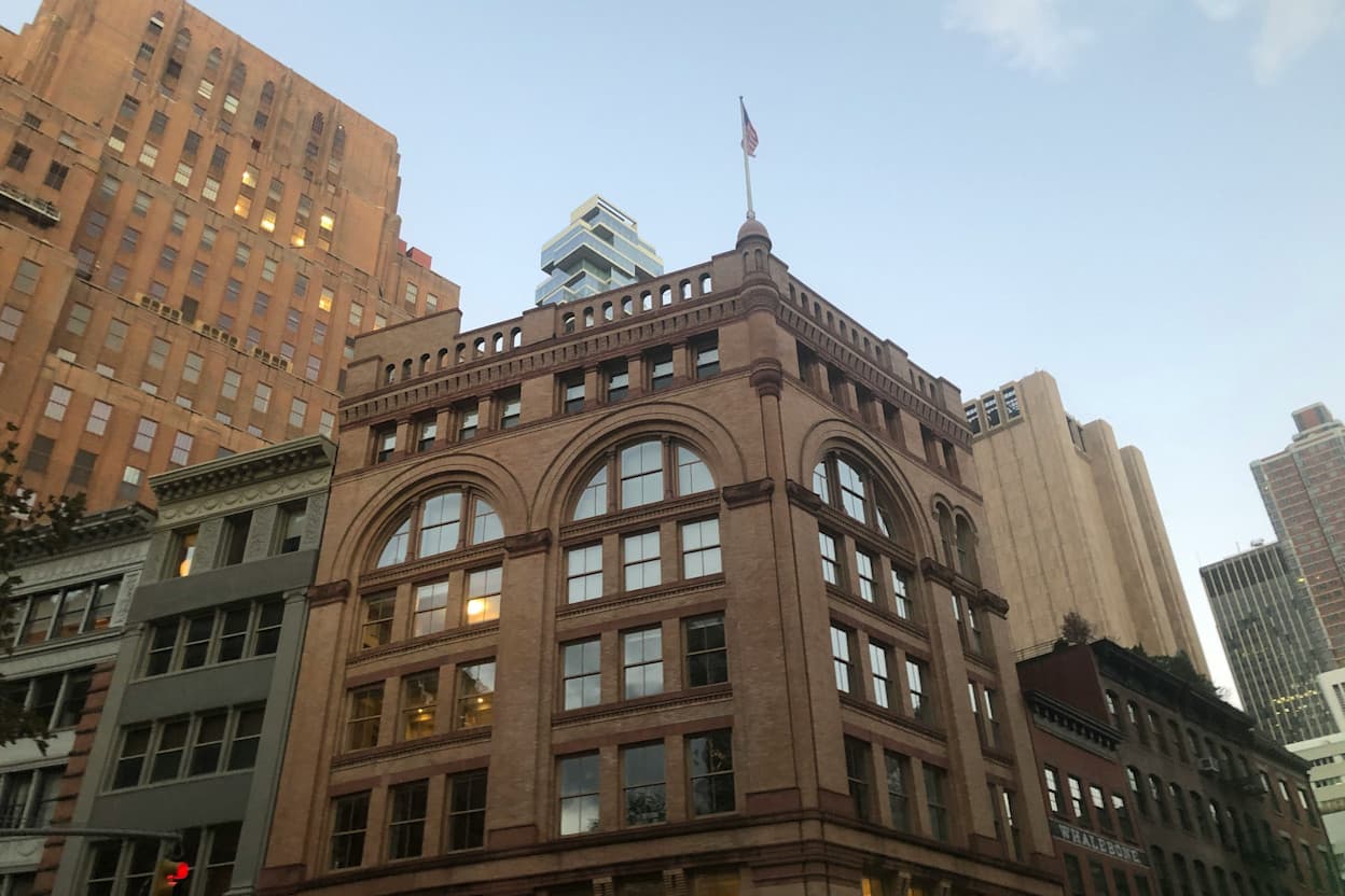 Late afternoon view of brown beige buildings located in the Tribeca neighborhoods of New York City.