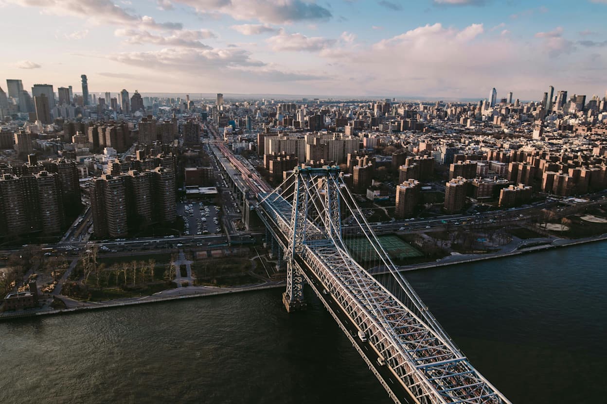 Birds-eye view of the New York City skyline, the Brooklyn Bridge, the East River and Williamsburg.