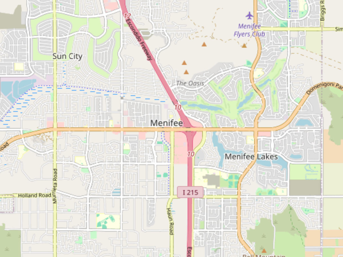 Map showing Menifee area with highways I-215 and Escondido Freeway, and labeled locations Sun City, Menifee Lakes, and Menifee Flyers Club.