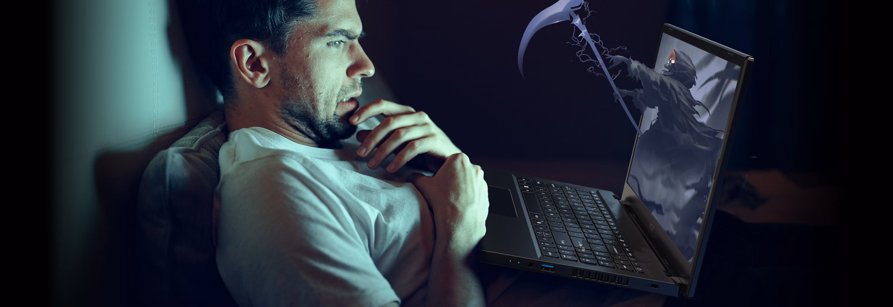 Guy watching a 3D movie on the Aspire laptop