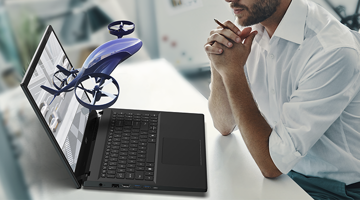 Guy watching a 3D design on the 3D laptop