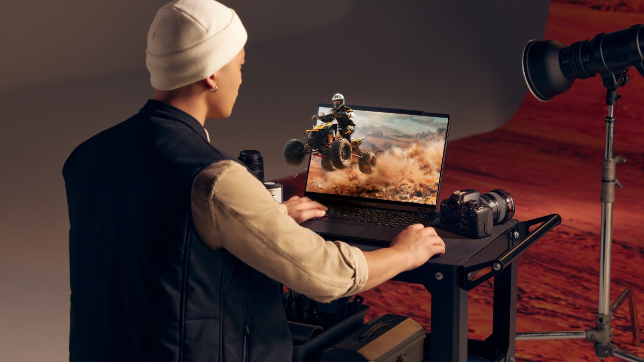 Designer reviews the 3D stereo picture on the immersive  3d laptop