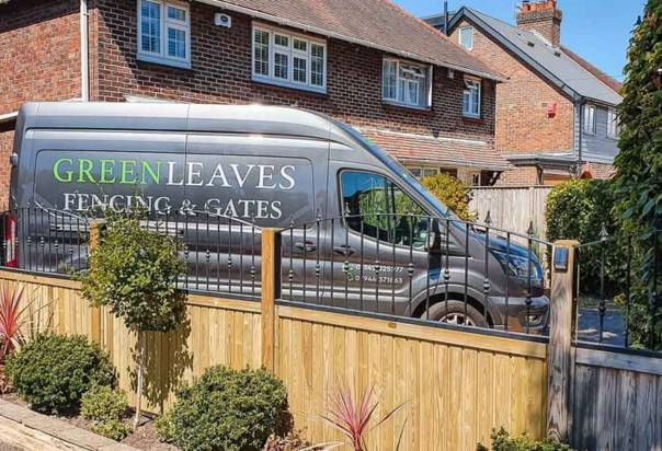 Timber garden gate with matching trellis fencing installed by Green Leaves Fencing & Gates in East Grinstead garden