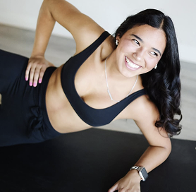 woman smiling while working out