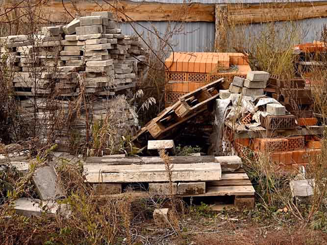 A pile of construction junk, concrete and bricks