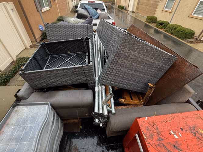 Furniture junk loaded into a trailer