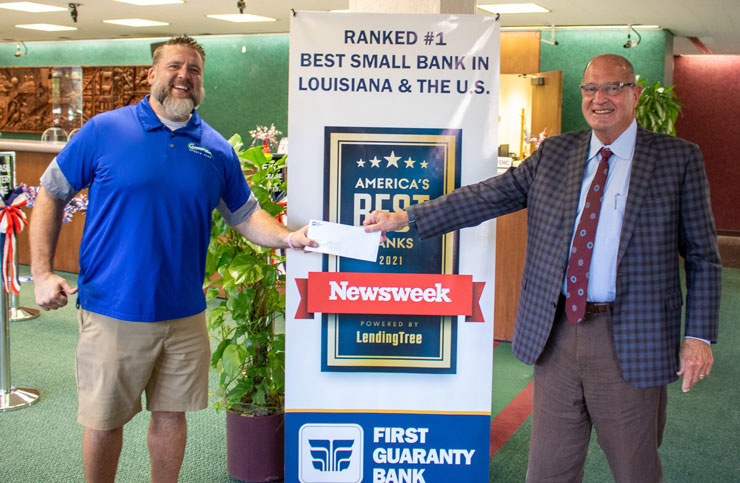 Ryan Barker, executive director of CSP and Alton Lewis, CEO and President of First Guaranty Bank