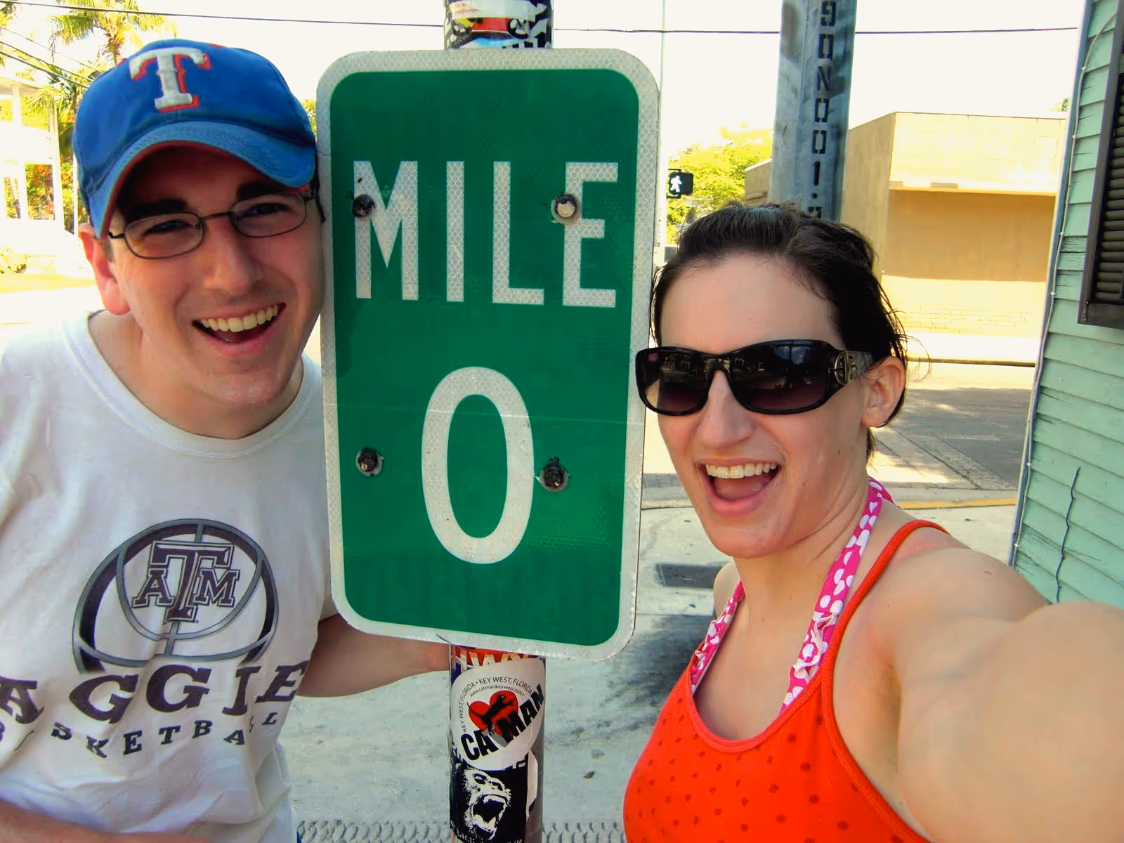 Young couple taking a selfie at Mile Marker 0