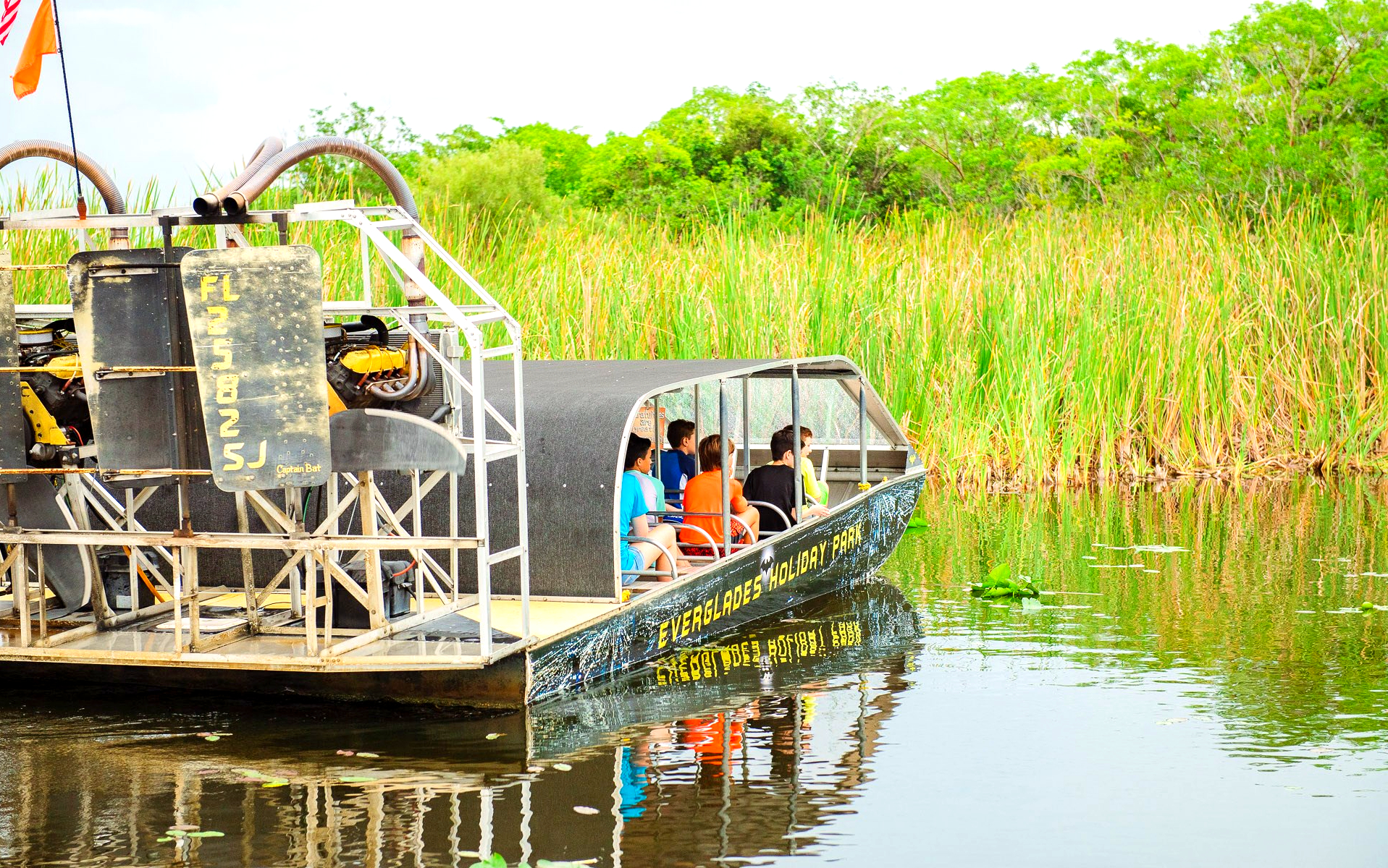 Airboat parked in the Everglades on the lookout for alligators