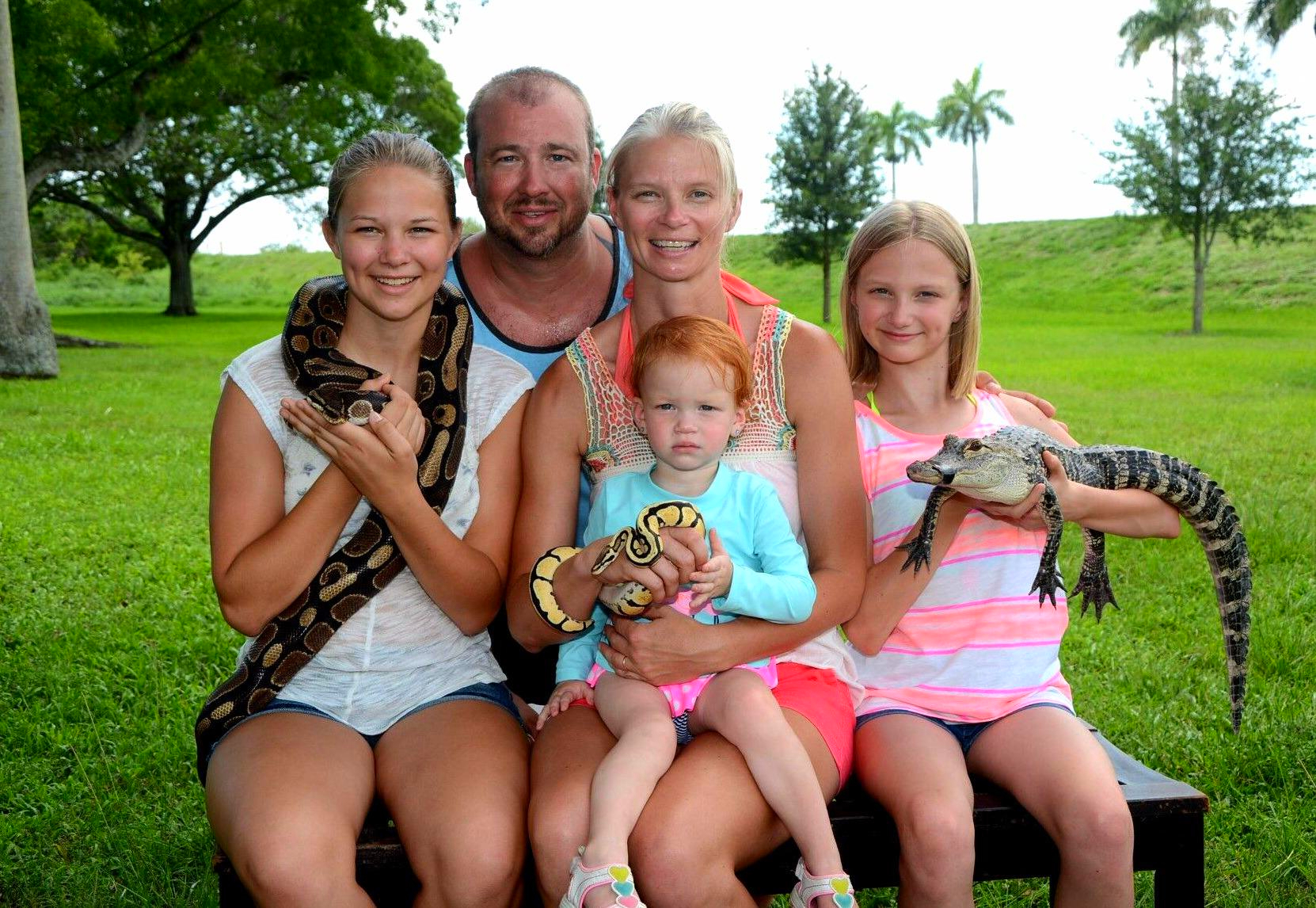 Family photo with gators and snakes