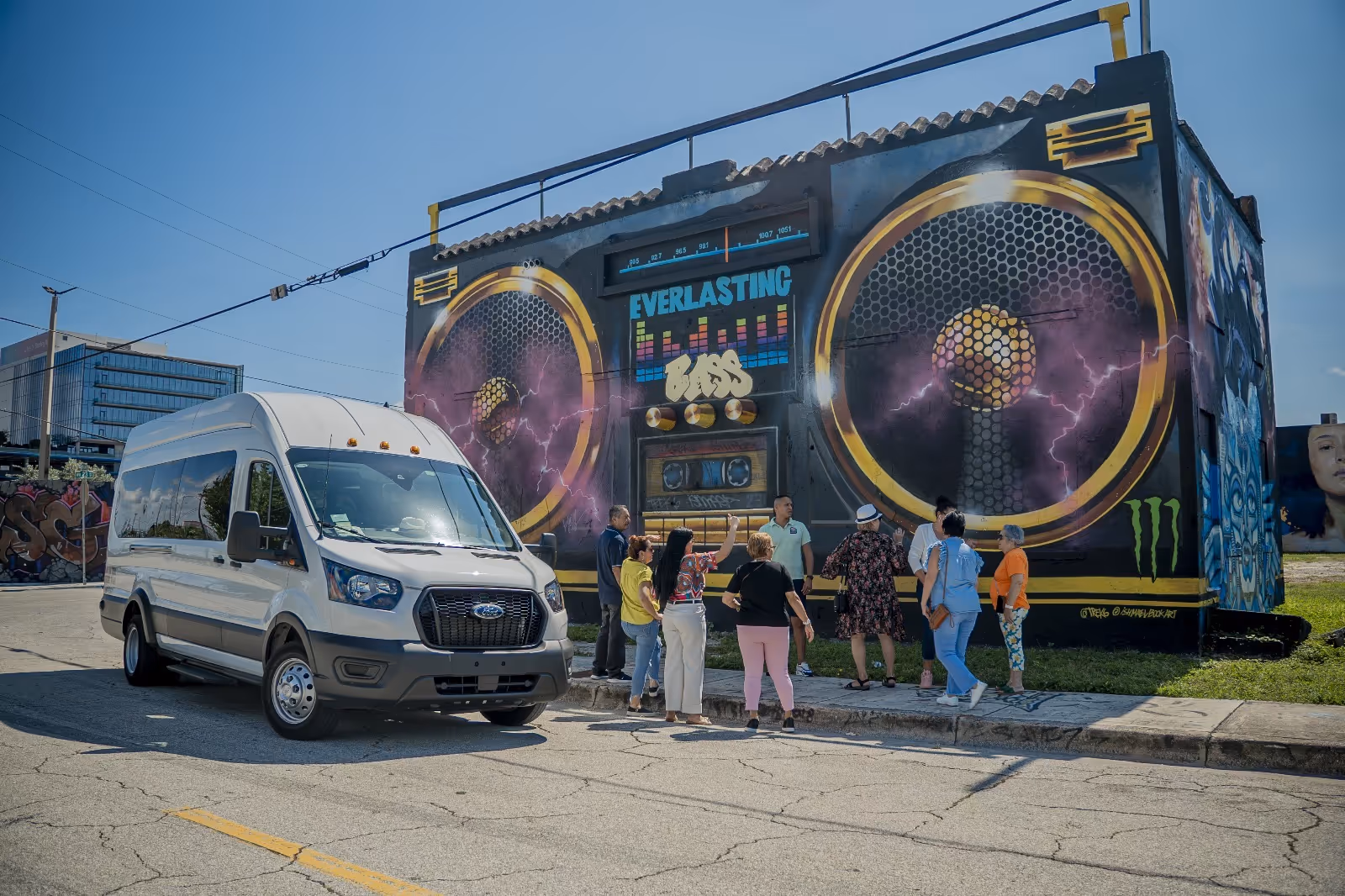 Tour van parked at the Everlasting Bass Boombox mural 