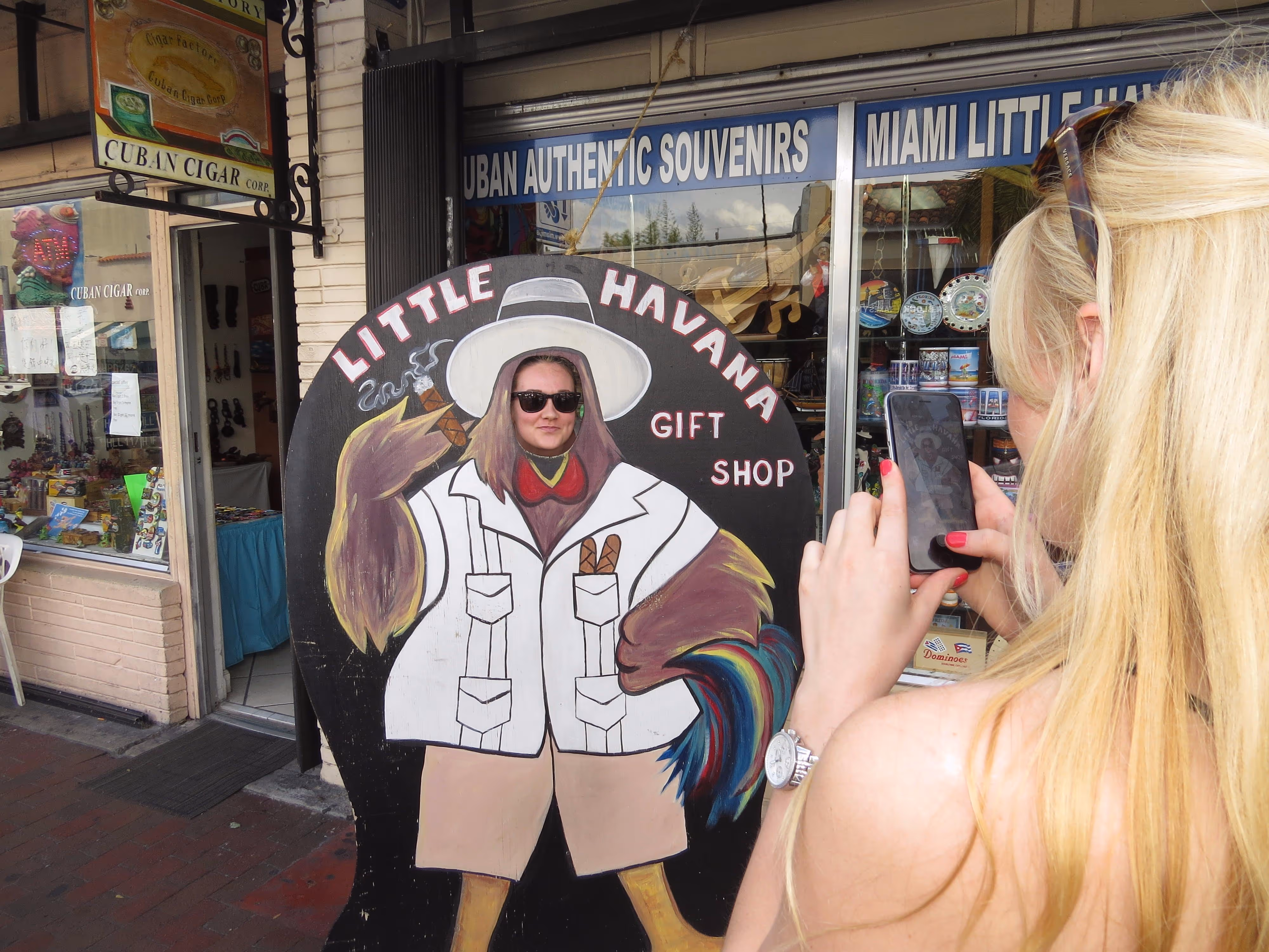 Young ladies having fun taking a  funny photo in Little Havana