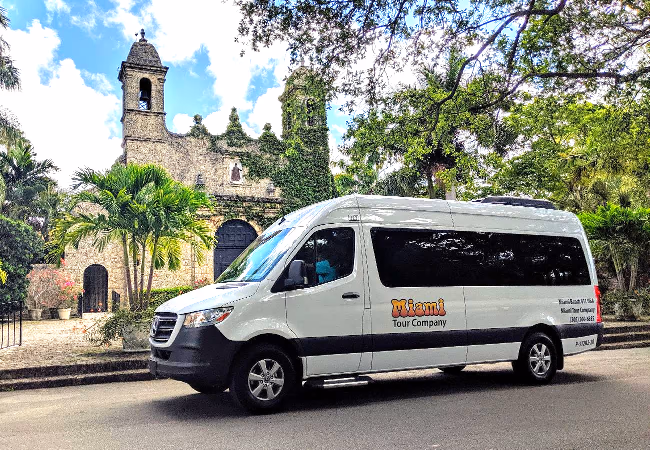 Tour van parked in from of the historic Presbyterian Church in Coconut Grove