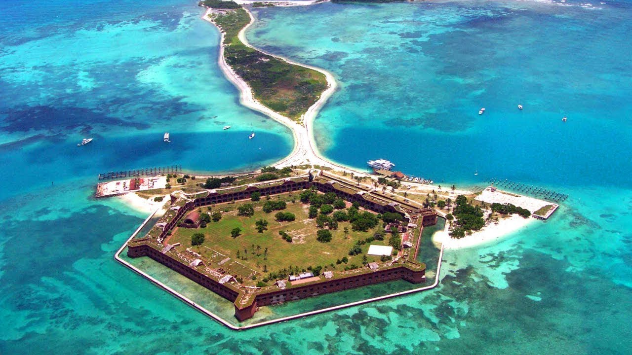 Drone shot of Fort Jefferson surrounded by blue water