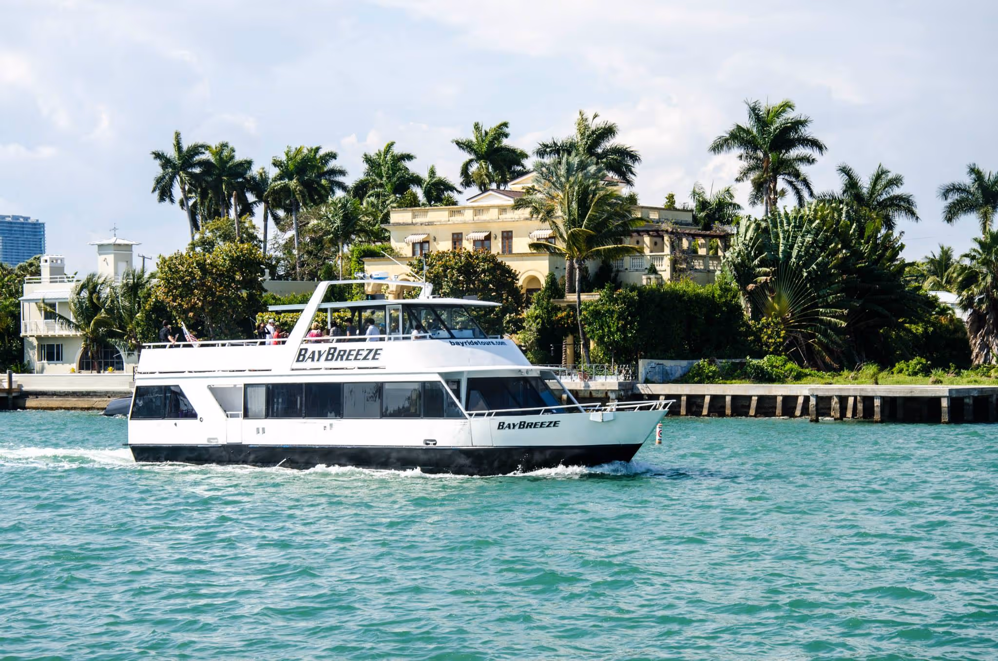 Cruising by a waterfront mansion on the boat tour