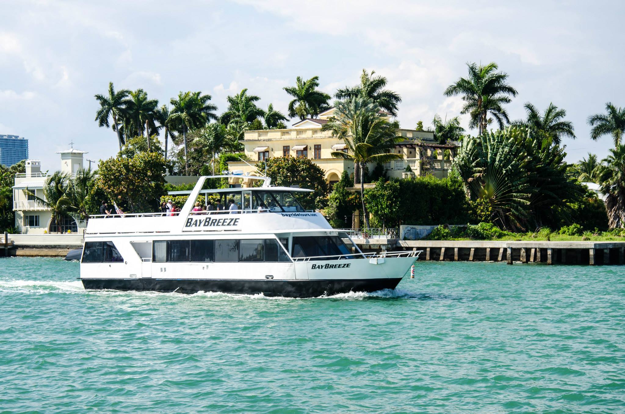 Cruising by a waterfront mansion on the boat tour