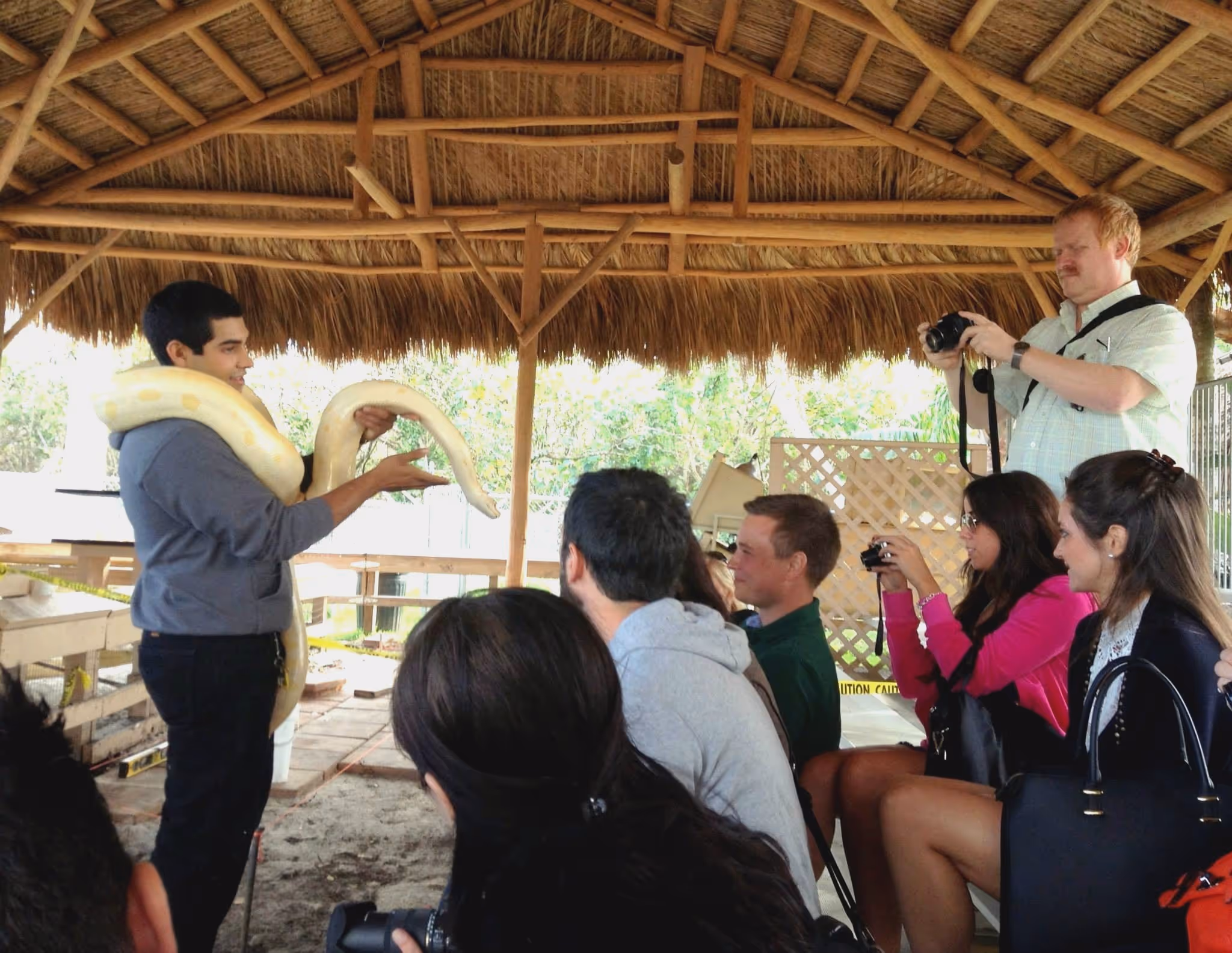 Wildlife expert showing an albino snake