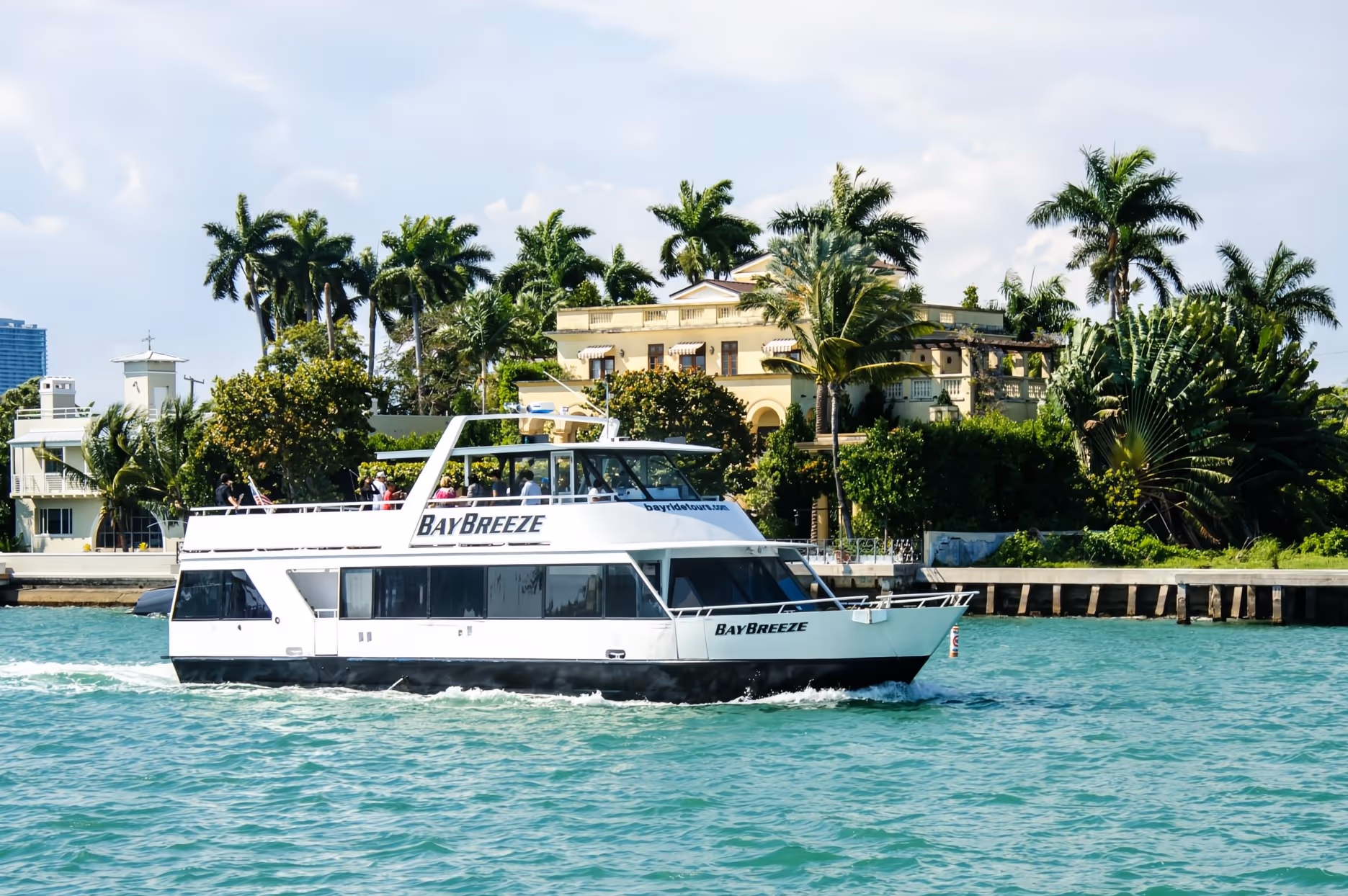 Cruising by a waterfront mansion on the boat tour