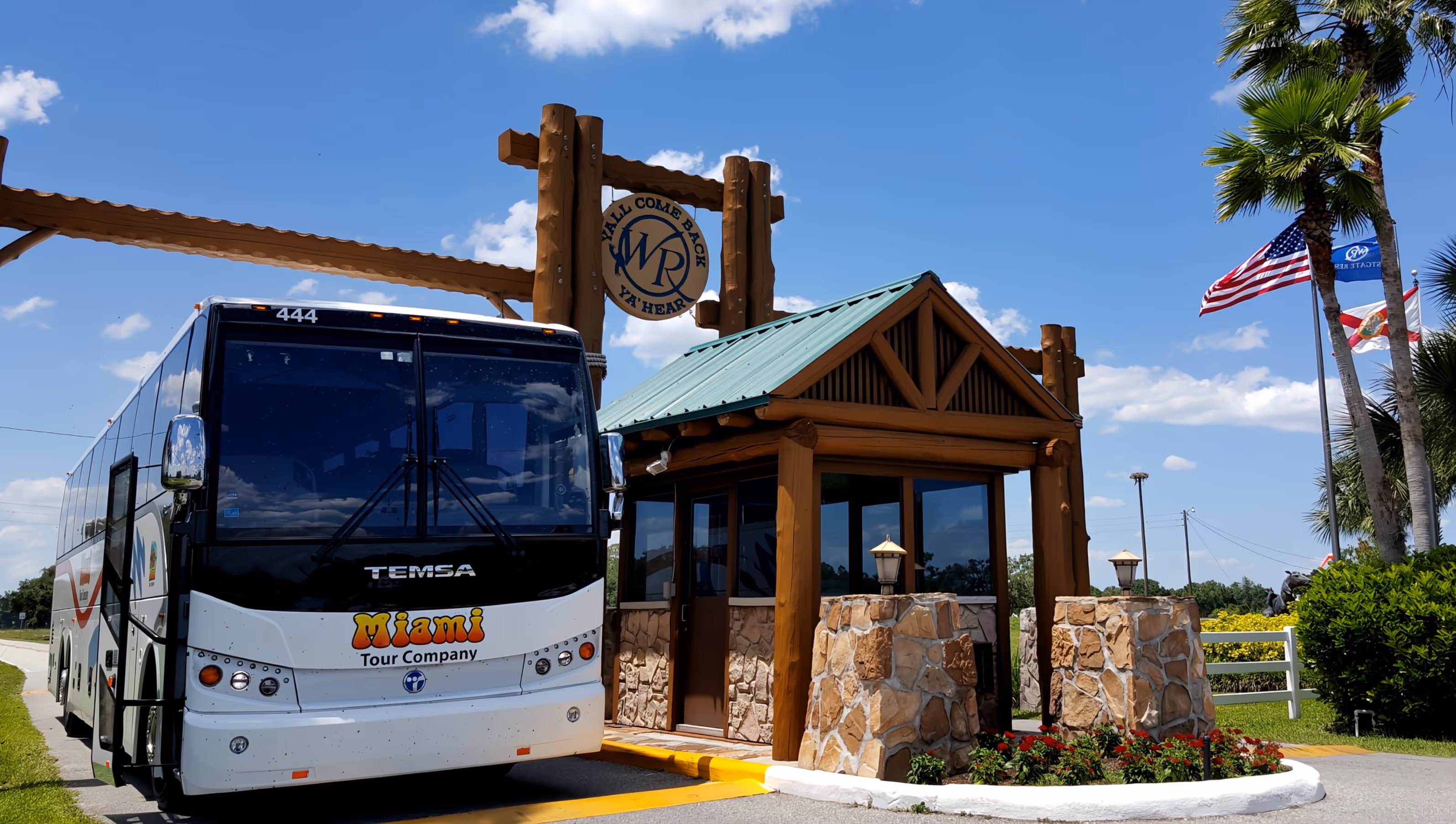 Motorcoach bus entering Everglades National Park under sunny skies