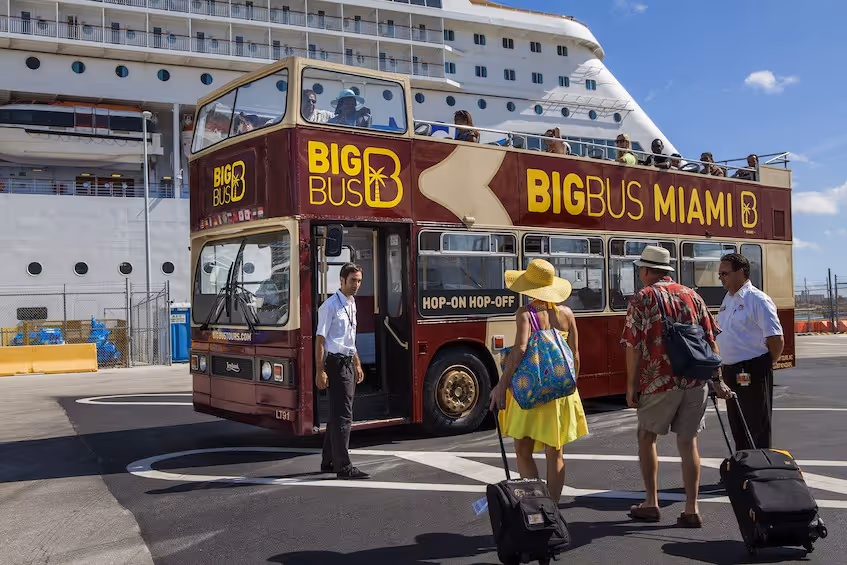 Passengers boarding the double-decker bus at Port Miami