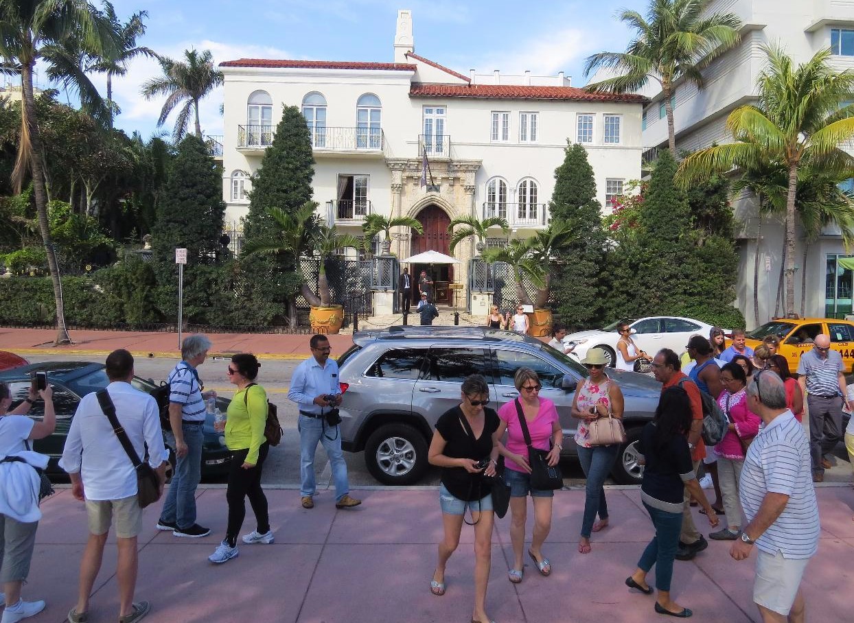 Walking tour group standing near the Versace Mansion