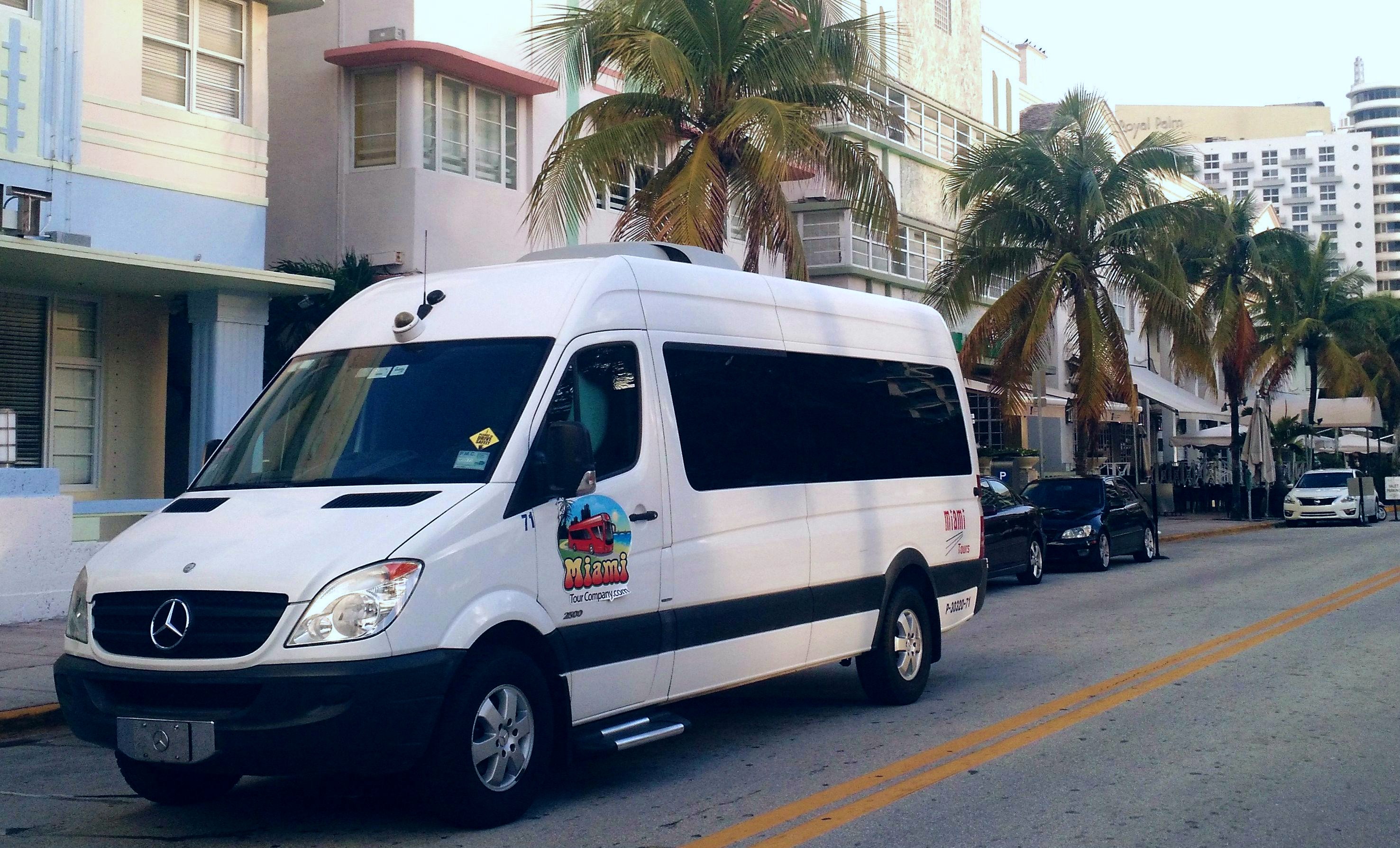 Private Shark Valley tour van, parked on Ocean Drive in Miami Beach