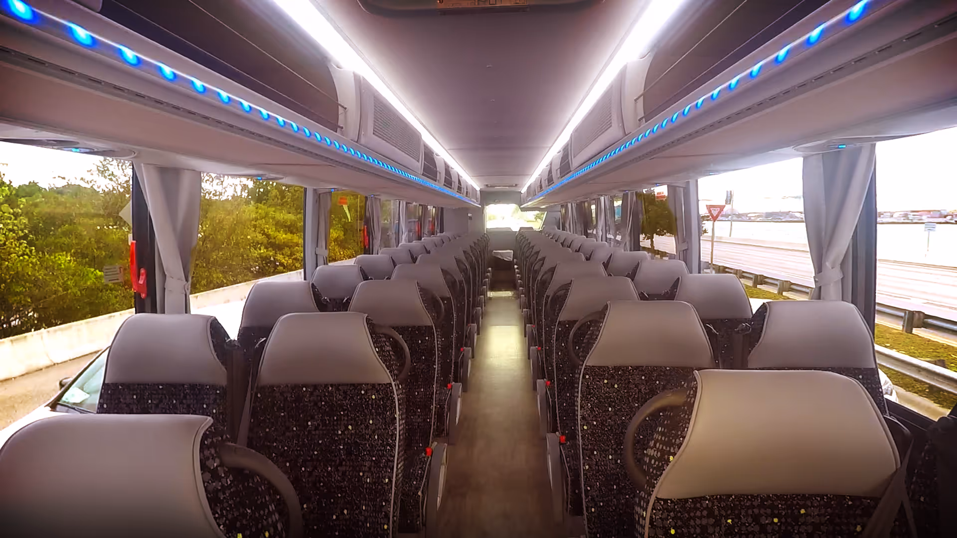 Inside the bus with blue neon lights