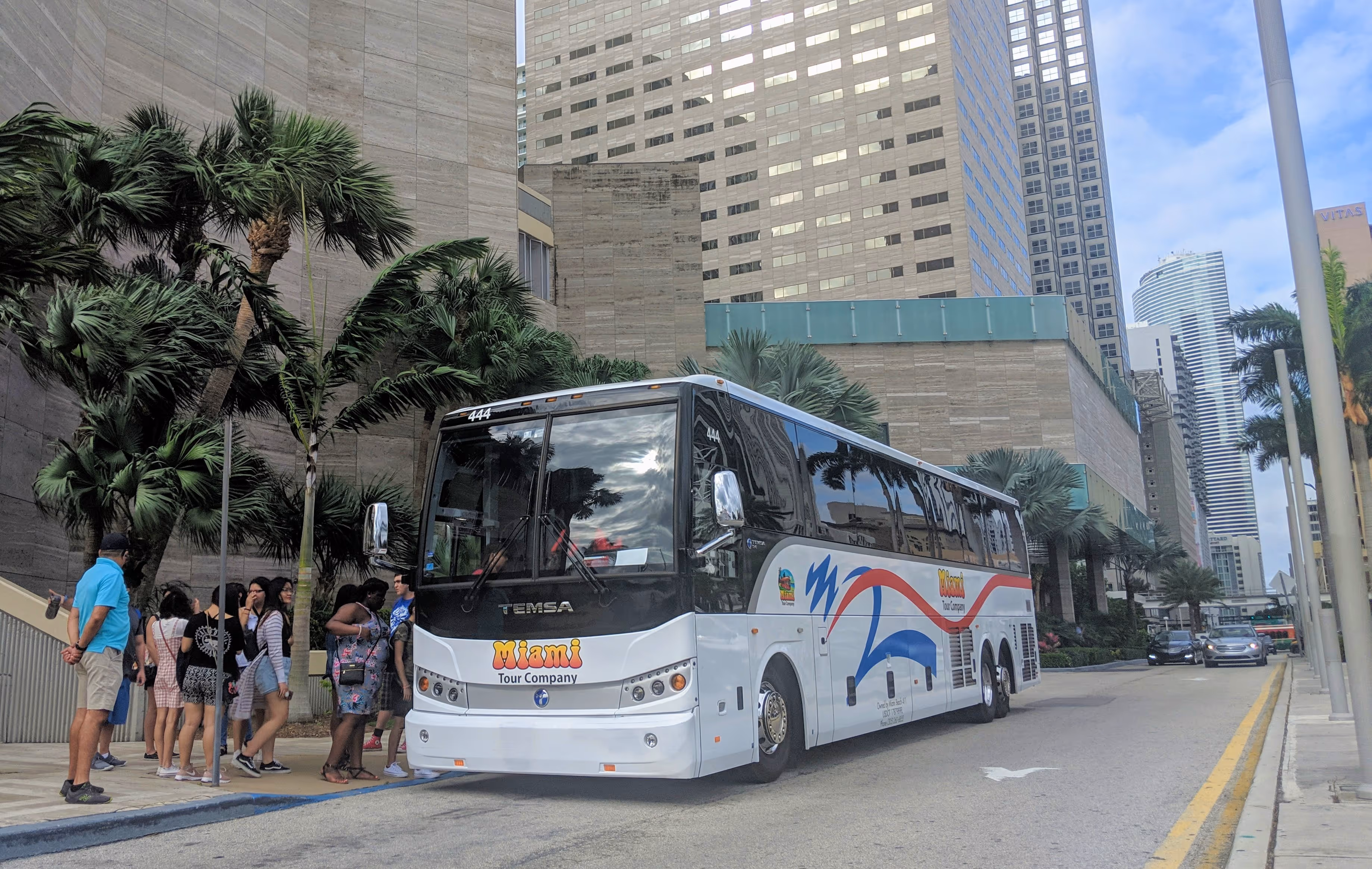 Private tour group boarding bus in Downtown