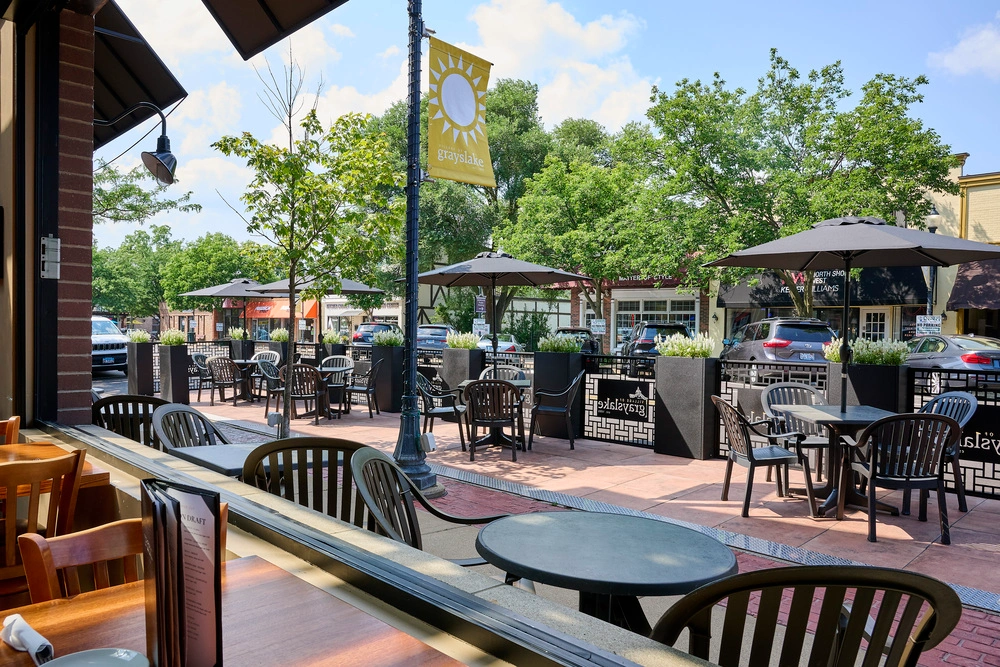 A view of the parklet in Grayslake, IL from inside the restaurant.