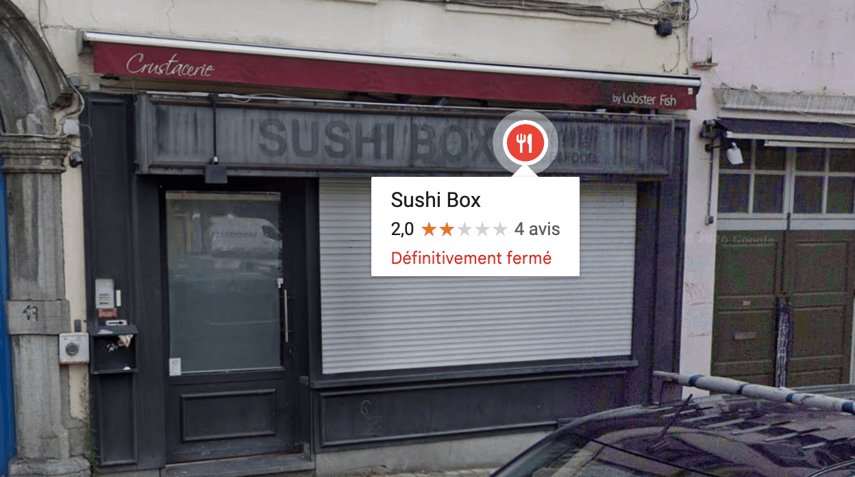 Ancienne façade Sushi Box avant rénovation – enseigne délavée à remplacer – Bruxelles