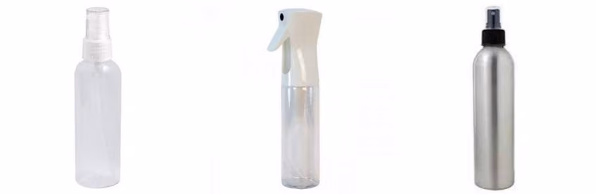 three spray bottles